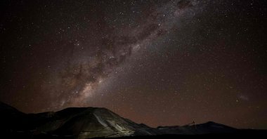 A night photo shows the Milky Way over the Los Azules Copper Mining Project in the Andes mountain range in Calingasta, San Juan province, Argentina, April 21, 2026. (AFP Photo)