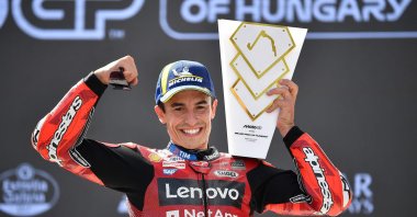 Ducati Lenovo's Marc Marquez celebrates with the trophy after the Hungarian Motorcycle MotoGP, in Balatonfokajar, Hungary, June 7, 2026. (AFP Photo)
