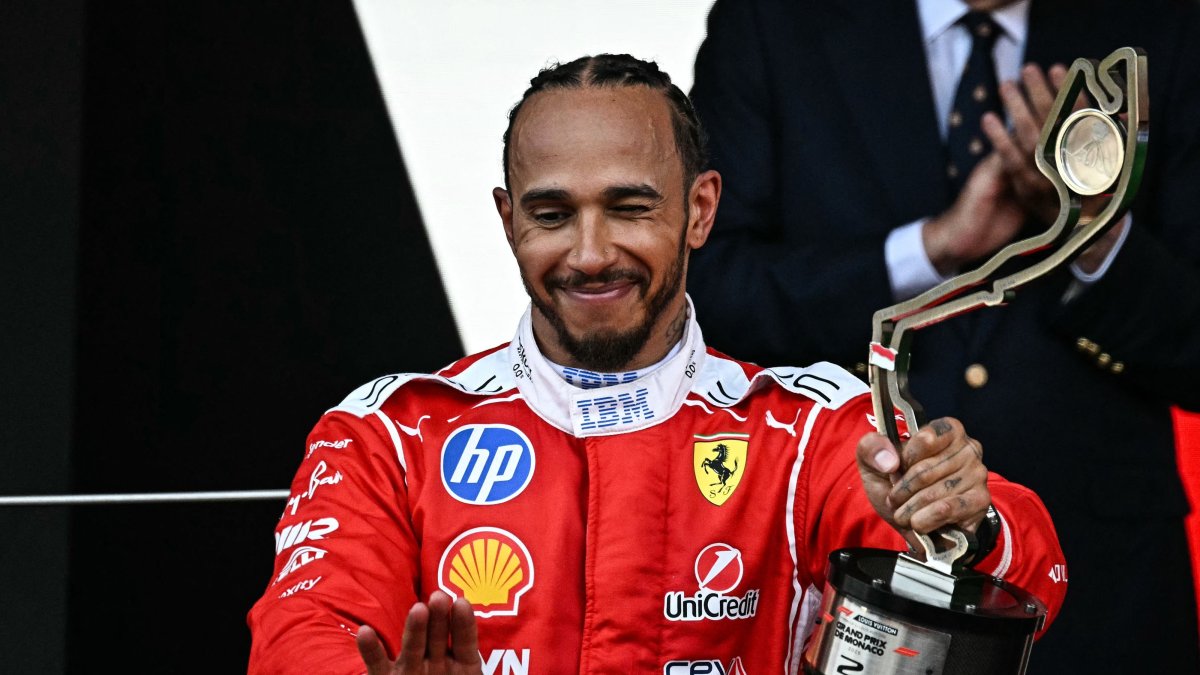 Second-placed Ferrari's British driver Lewis Hamilton celebrates on the podium after competing in the Monaco Formula 1 Grand Prix at the Monaco street circuit, Monaco, June 7, 2026. (AFP Photo)