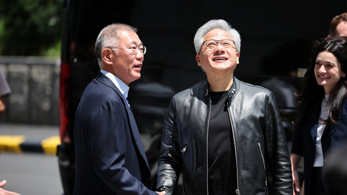 Nvidia CEO Jensen Huang is greeted by Hyundai Motor Group Executive Chair Euisun Chung during Huang's visit to Hyundai Motor’s headquarters, Seoul, South Korea, June 8, 2026. (Reuters Photo)