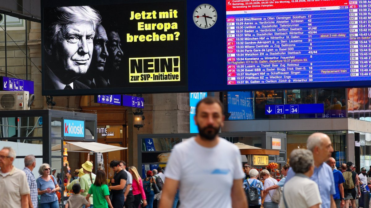 Adverts featuring portraits of U.S. President Donald Trump, Russian President Vladimir Putin and Chinese President Xi Jinping urging voters to reject a proposal are displayed at a train station ahead of a June 14 vote on a plan backed by the right‑wing Swiss People’s Party (SVP) to cap the population at 10 million inhabitants, Zurich, Switzerland, May 27, 2026. (Reuters Photo)