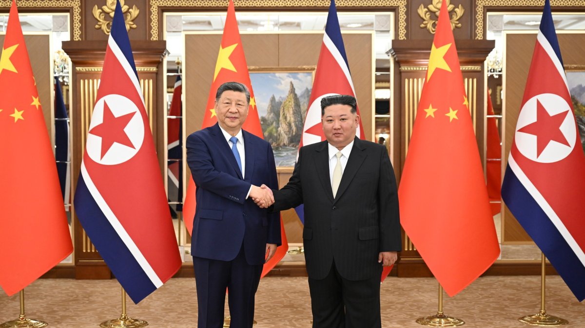 Chinese President Xi Jinping (L) and North Korean leader Kim Jong Un shake hands in Pyongyang, North Korea, June 8, 2026. (AP Photo)