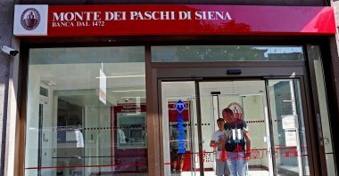People are seen inside a Monte dei Paschi di Siena bank in Rome, Italy, Aug. 16, 2018. (Reuters Photo)