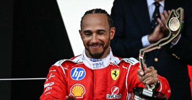 Second-placed Ferrari's British driver Lewis Hamilton celebrates on the podium after competing in the Monaco Formula 1 Grand Prix at the Monaco street circuit, Monaco, June 7, 2026. (AFP Photo)