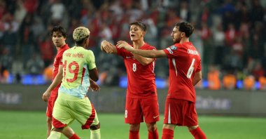 Türkiye's Arda Güler (2nd R) and Spain's Lamine Yamal clash during the World Cup European Qualifiers Group E at Konya Stadium, Konya, Türkiye, Sept. 7, 2025. (Getty Images Photo)
