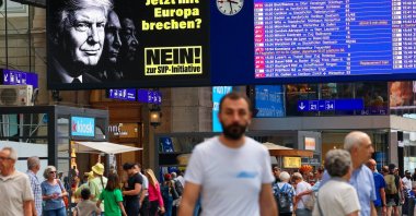 Adverts featuring portraits of U.S. President Donald Trump, Russian President Vladimir Putin and Chinese President Xi Jinping urging voters to reject a proposal are displayed at a train station ahead of a June 14 vote on a plan backed by the right‑wing Swiss People’s Party (SVP) to cap the population at 10 million inhabitants, Zurich, Switzerland, May 27, 2026. (Reuters Photo)