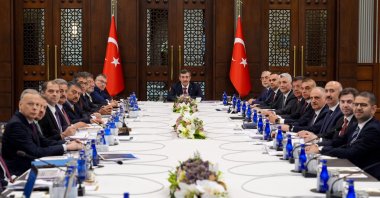 Vice President Cevdet Yılmaz (C) and other officials pose for a photo before the Economic Coordination Board (EKK) meeting, Ankara, Türkiye, June 8, 2026. (AA Photo)