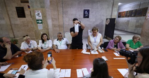 Members of an electoral commission count votes after polling stations closed in a parliamentary election in Yerevan, Armenia, June 7, 2026. (Reuters Photo)