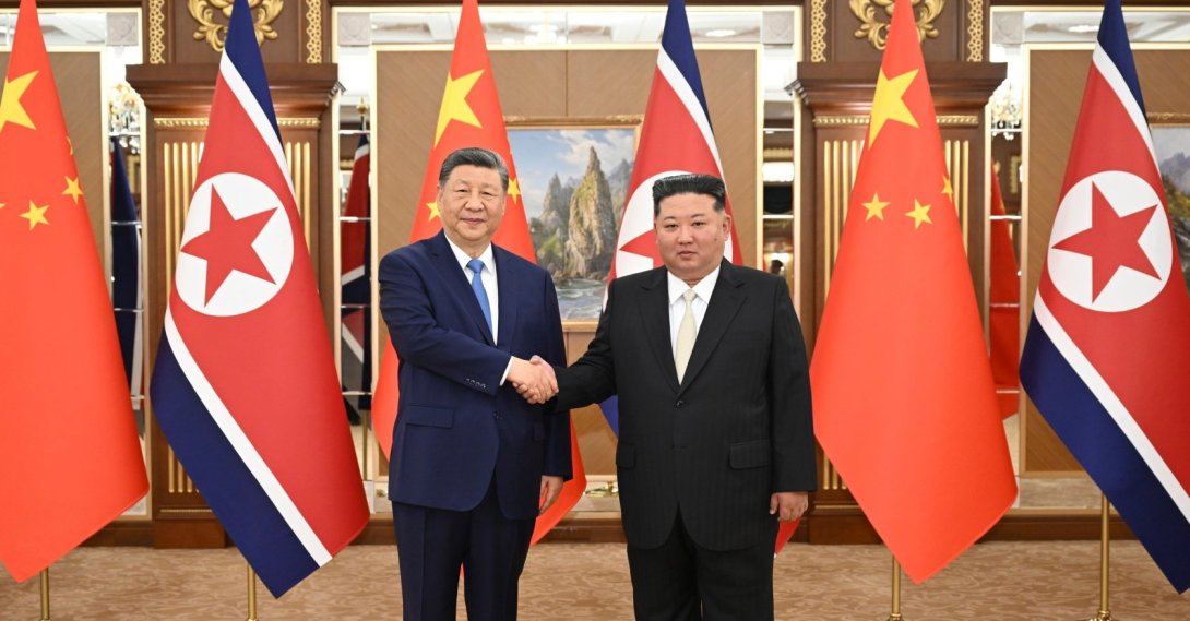 Chinese President Xi Jinping (L) and North Korean leader Kim Jong Un shake hands in Pyongyang, North Korea, June 8, 2026. (AP Photo)