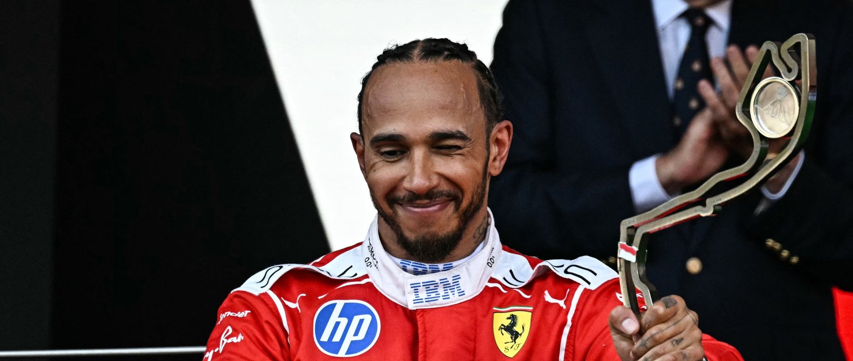 Second-placed Ferrari's British driver Lewis Hamilton celebrates on the podium after competing in the Monaco Formula 1 Grand Prix at the Monaco street circuit, Monaco, June 7, 2026. (AFP Photo)