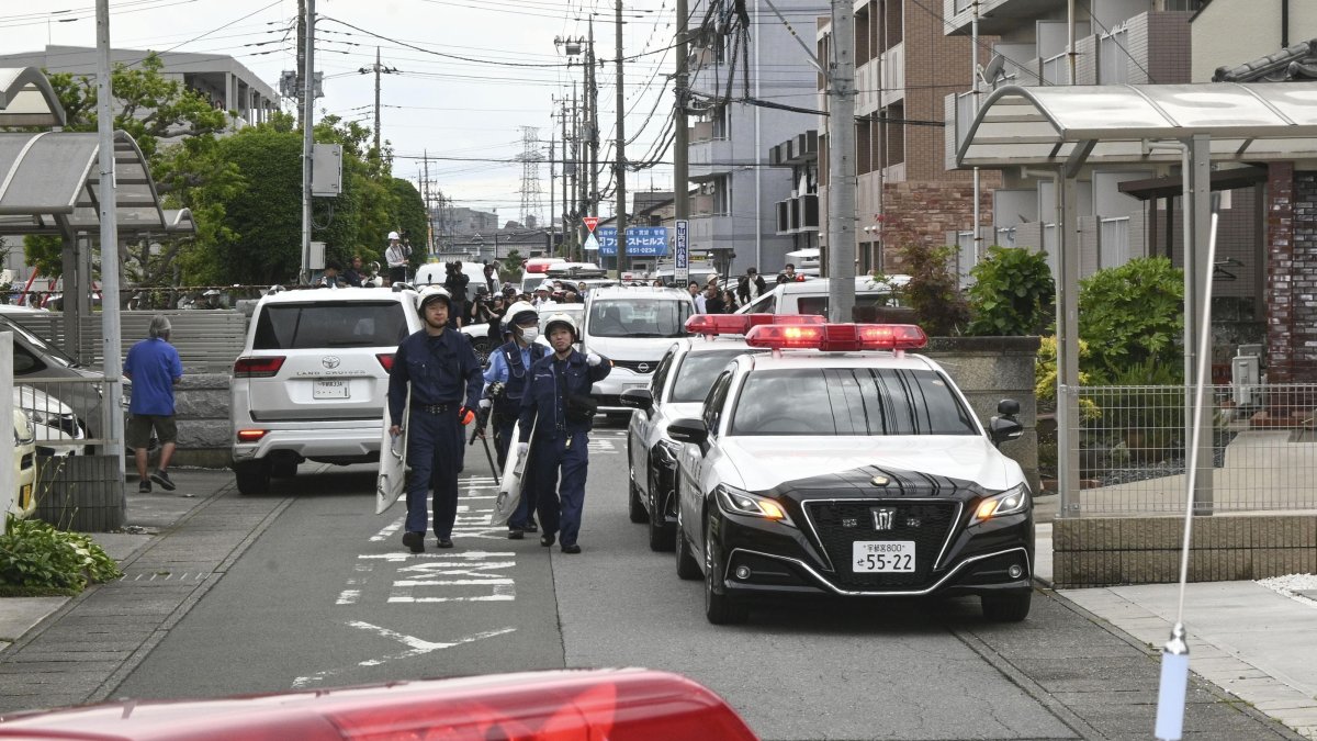 Police are seen at a residential area where a bear showed up in Utsunomiya, north of Tokyo, Japan, June 9, 2026. (AP Photo)
