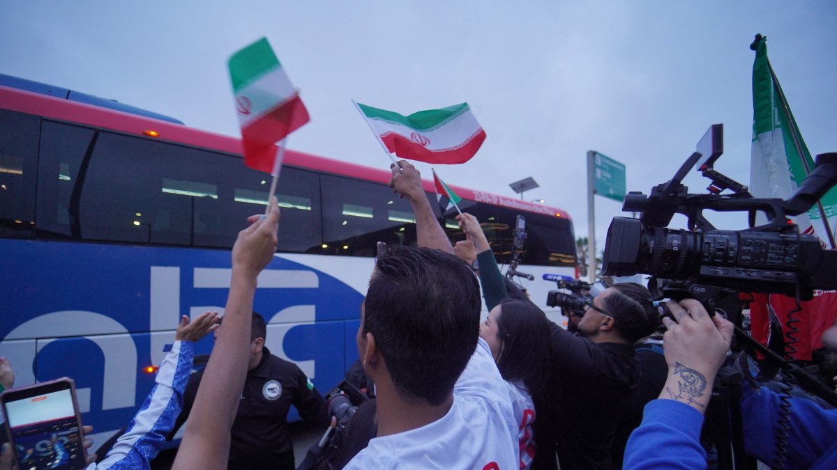 Iran fans look on as Team Iran's bus arrives at the Tijuana International Airport for the 2026 FIFA World Cup, Tijuana, Mexico, June 7, 2026. (Reuters Photo)