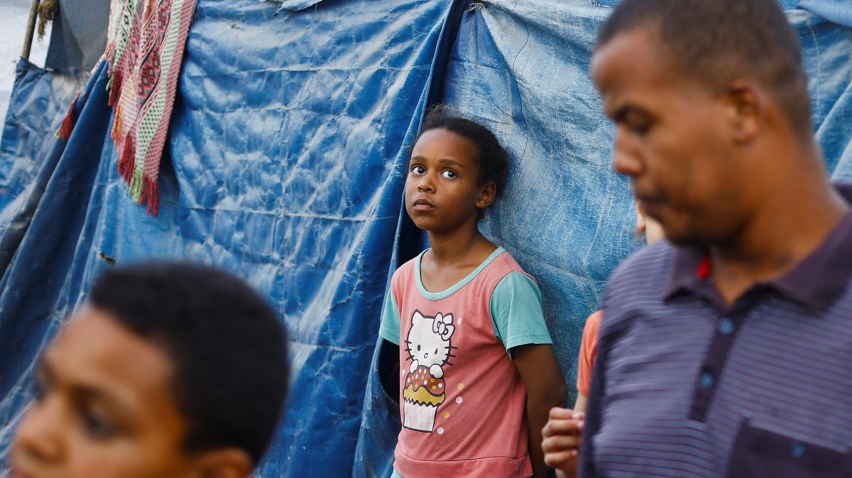 A Palestinian child is seen at a tent camp for internally displaced people, in Deir al-Balah, in the central Gaza Strip, Palestine, June 7, 2026. (Reuters Photo)
