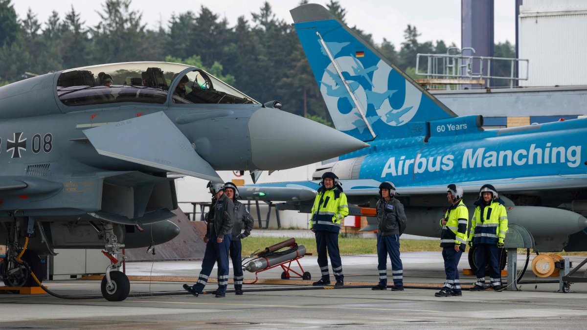 Two Eurofighters are prepared during the Defense Summit 2026 at Airbus Defence and Space GmbH in Manching, Bavaria, southern Germany, May 20, 2026. (AFP Photo)