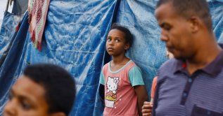 A Palestinian child is seen at a tent camp for internally displaced people, in Deir al-Balah, in the central Gaza Strip, Palestine, June 7, 2026. (Reuters Photo)