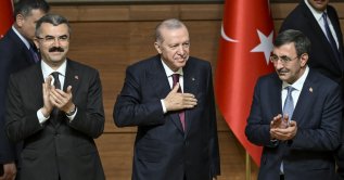President Recep Tayyip Erdoğan greets the audience at the National Security Conference, Ankara, Türkiye, June 9, 2026. (AA Photo)