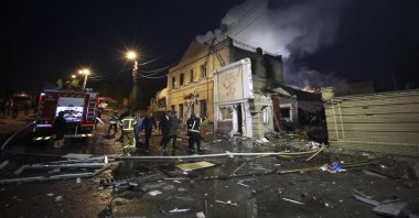 Ukrainian rescuers work at the site of a Russian strike on a residential area in Kharkiv, Ukraine, June 9, 2026. (EPA Photo)