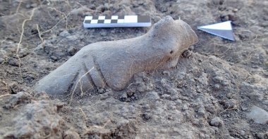 A headless female figurine dating back 8,000 years is discovered at Kanlıtaş Mound, northwestern Türkiye, June 5, 2026. (AA Photo)