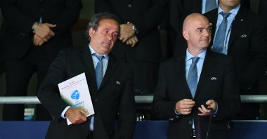 Michel Platini (L) and Gianni Infantino look on during the award ceremony after the UEFA U21 Championship match, Prague
Sweden, June 30, 2015. (Getty Images Photo)