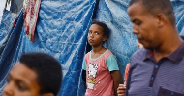 A Palestinian child is seen at a tent camp for internally displaced people, in Deir al-Balah, in the central Gaza Strip, Palestine, June 7, 2026. (Reuters Photo)