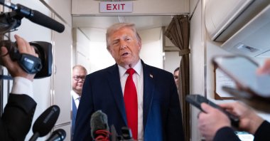 U.S. President Donald Trump speaks with the press aboard Air Force One as he flies from Joint Base Andrews in Maryland to Eau Claire, Wisconsin, June 5, 2026. (AFP Photo)