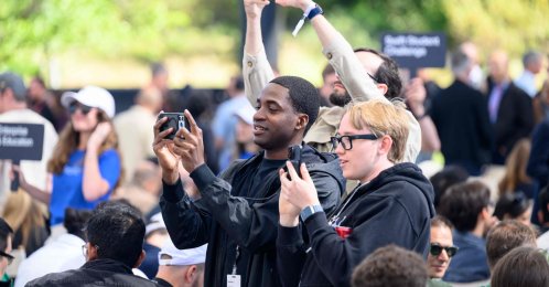 Attendees watch as Apple CEO Tim Cook (not pictured) speaks at his final Worldwide Developers Conference (WWDC) at Apple Park, Cupertino, California, June 8, 2026. (AFP Photo)