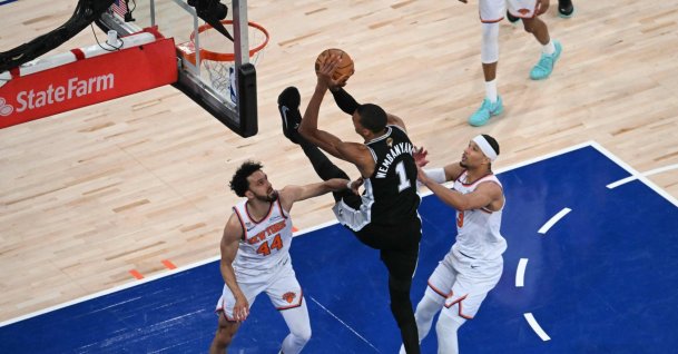 San Antonio Spurs' (C) Victor Wembanyama shoots the ball while being defended by Knicks' Landry Shamet (L) and Josh Hart during Game Three of the NBA Finals between the San Antonio Spurs and the New York Knicks at Madison Square Garden, New York City, June 8, 2026. (AFP Photo)