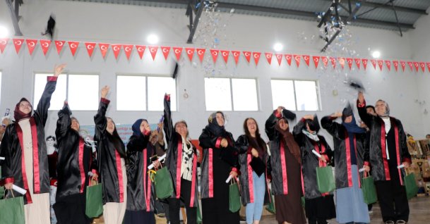 Open education graduates celebrate by tossing their caps during a graduation ceremony, Van, Türkiye, June 9, 2026. (DHA Photo)