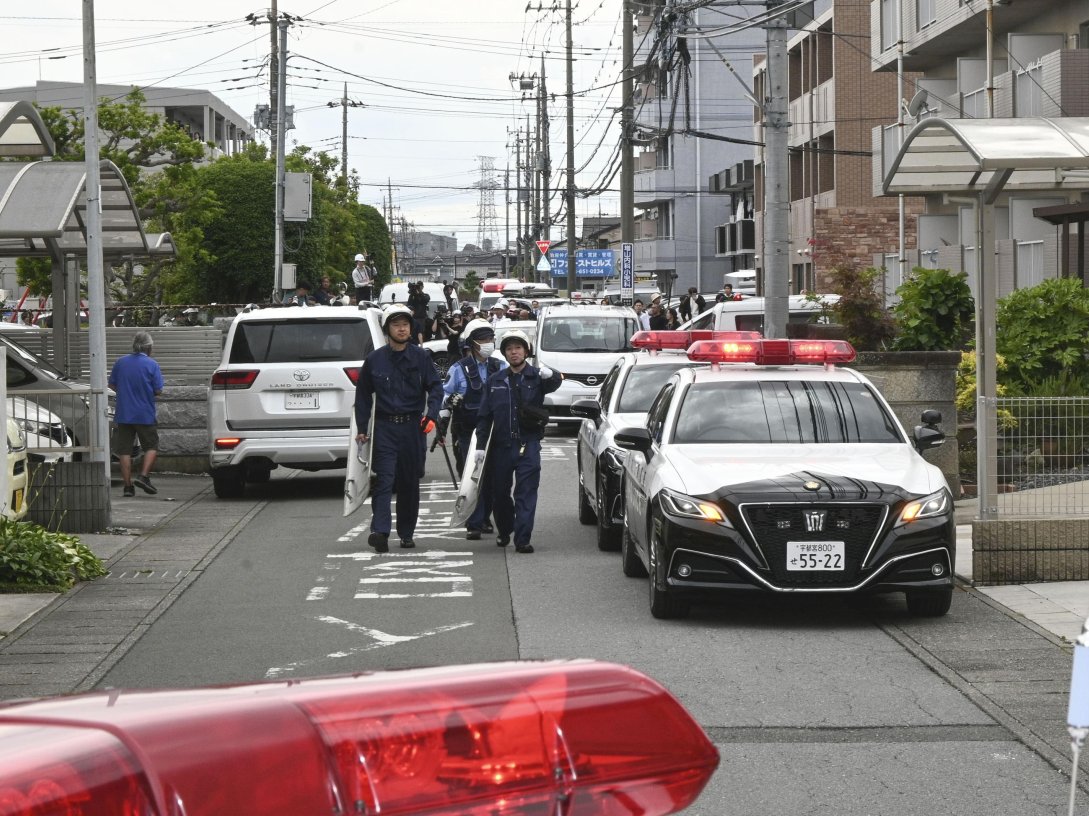 Police are seen at a residential area where a bear showed up in Utsunomiya, north of Tokyo, Japan, June 9, 2026. (AP Photo)