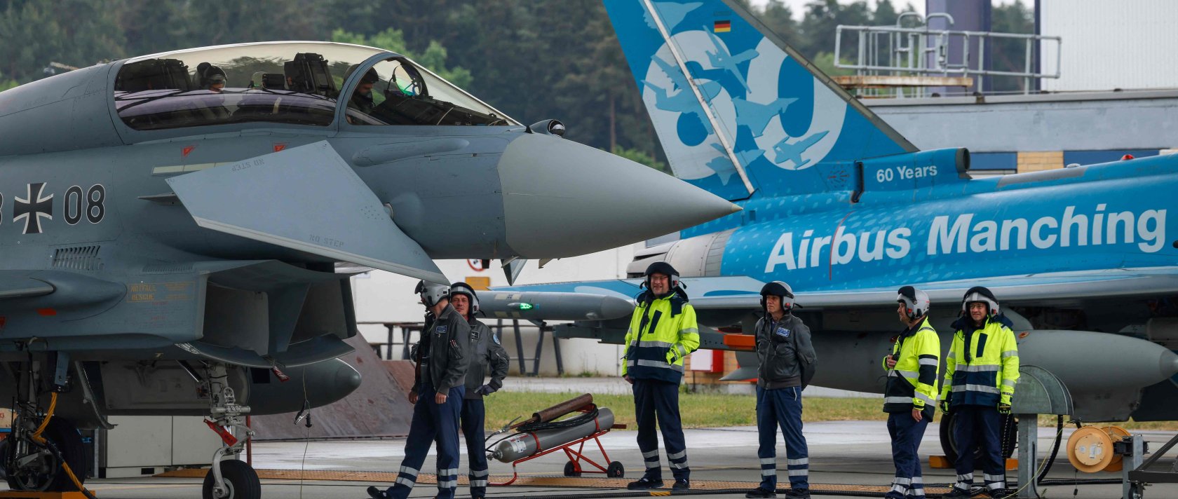 Two Eurofighters are prepared during the Defense Summit 2026 at Airbus Defence and Space GmbH in Manching, Bavaria, southern Germany, May 20, 2026. (AFP Photo)