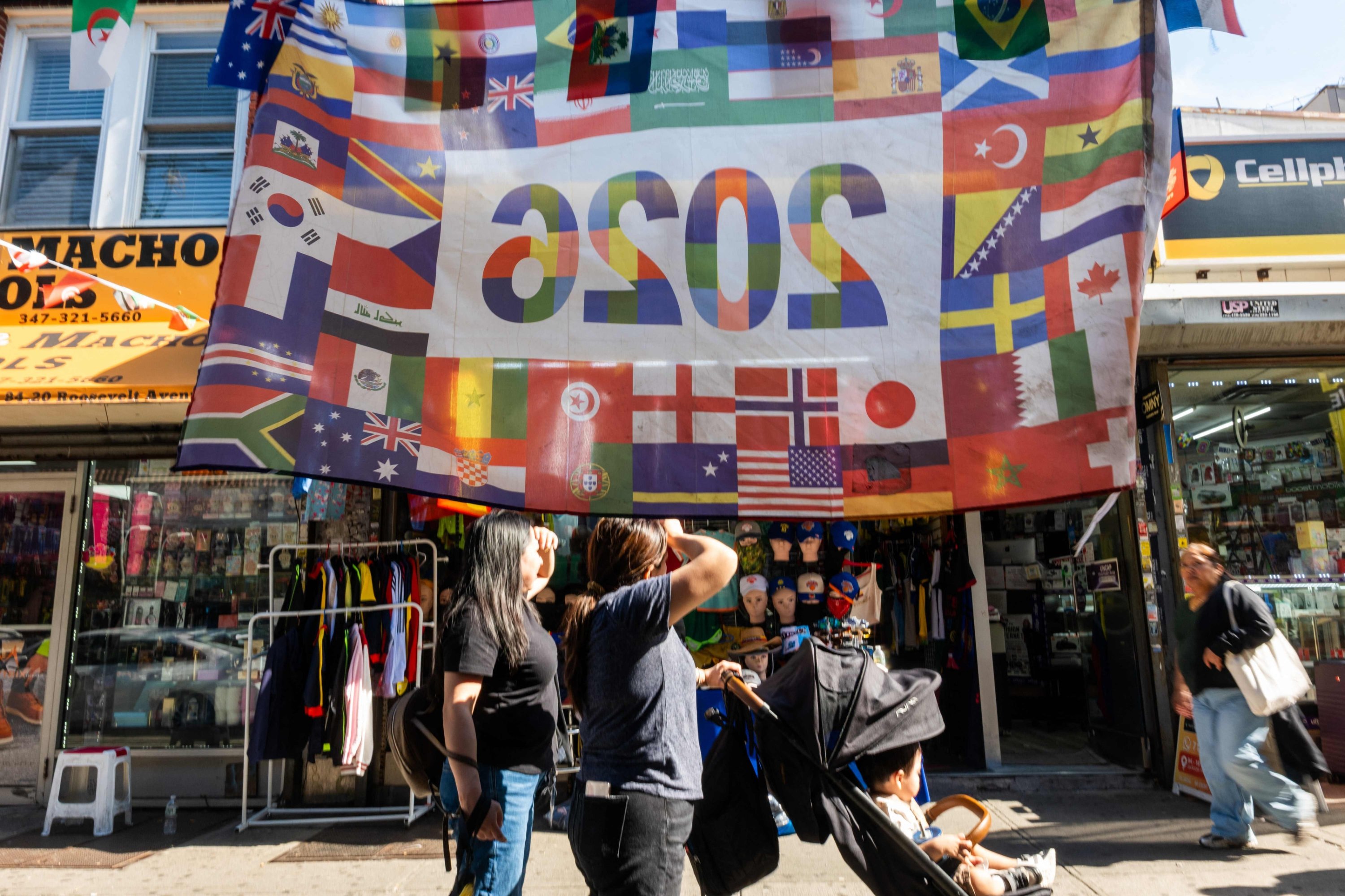 Businesses along Roosevelt Avenue prepare for the World Cup by displaying flags, football jerseys, and banners, New York City, U.S., June 9, 2026. (AFP Photo)