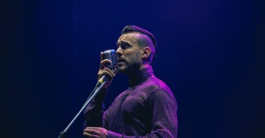 Turkish singer Cem Adrian performs at a concert in Istanbul, Türkiye, Sept. 7, 2024. (Shutterstock Photo)
