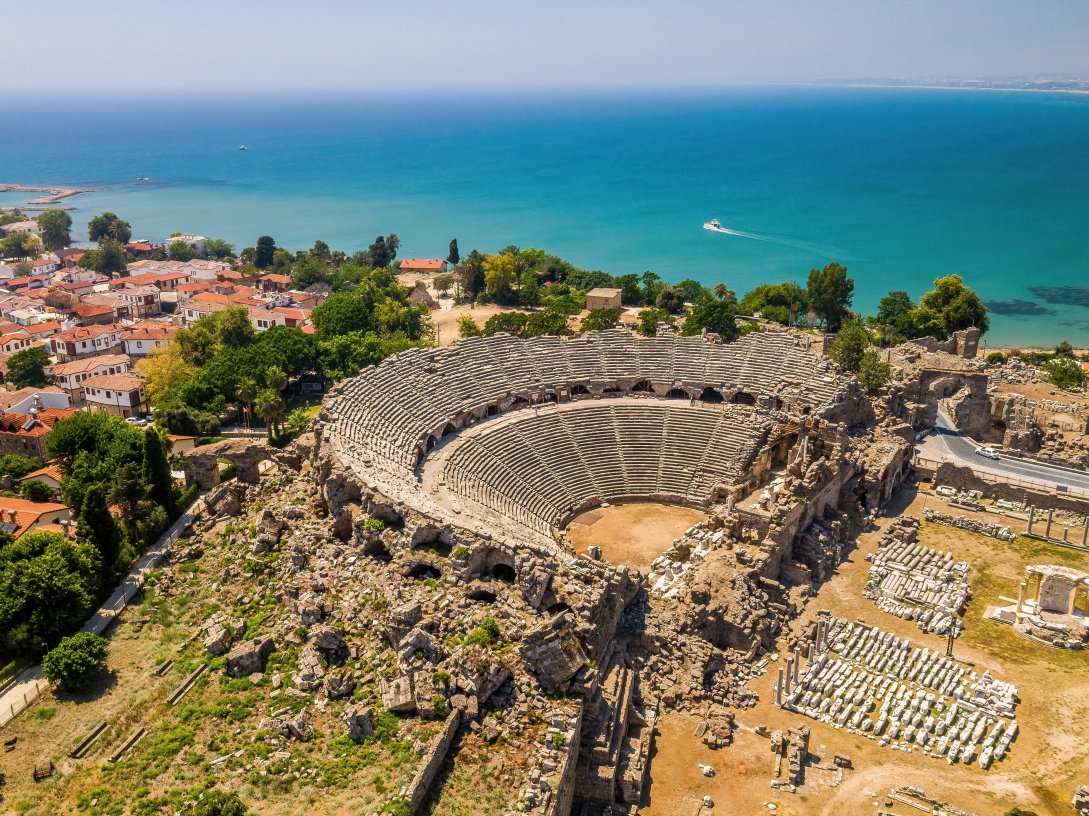 An aerial view of the ancient city of Side and its amphitheater, Antalya, southern Türkiye. (Shutterstock Photo)