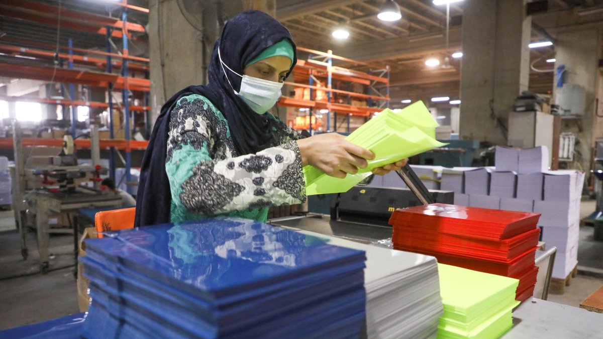 A worker works at Oriental Paper Products, a stationery factory, Fanar, Lebanon, Nov. 1, 2021. (Reuters Photo)
