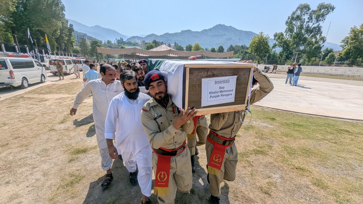 Pakistani soldiers and relatives carry a coffin during the funeral of victims after a Pakistan army Mi-17 helicopter crashed near Muzaffarabad, Pakistan-controlled Kashmir, June 11, 2026. (EPA Photo)