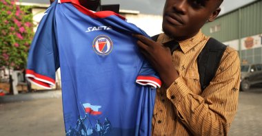 A person holds up a Haiti national team jersey, Port-au-Prince, Haiti, June 10, 2026. (EPA Photo)