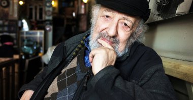Photographer Ara Güler poses at the Ara Cafe, Istanbul, Türkiye, April 1, 2012. (Getty Images Photo)