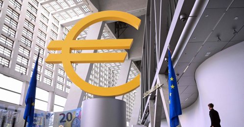 A visitor walks past a giant Euro sign inside the headquarters of the European Central Bank (ECB) in Frankfurt, Germany, June 11, 2026. (AFP Photo)