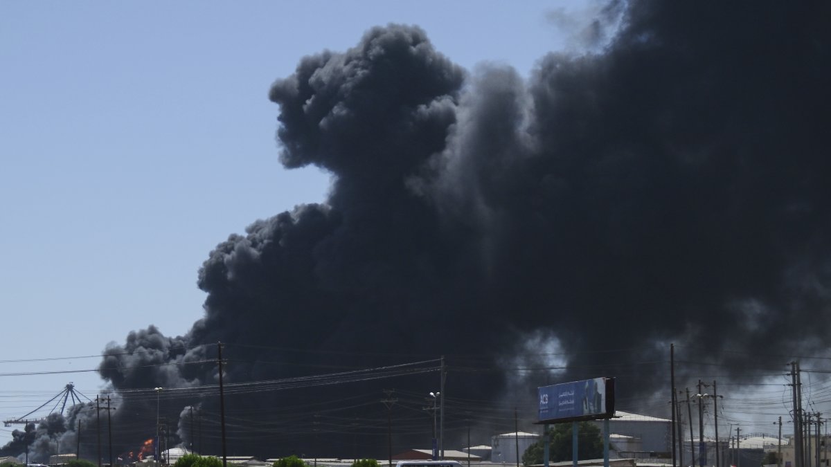 Smoke billows after drone strikes by the paramilitary Rapid Support Forces (RSF) targeted the northern port in the Red Sea city of Port Sudan, Sudan, May 6, 2025. (AP Photo)