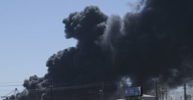 Smoke billows after drone strikes by the paramilitary Rapid Support Forces (RSF) targeted the northern port in the Red Sea city of Port Sudan, Sudan, May 6, 2025. (AP Photo)