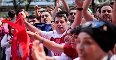Fans welcome Türkiye's national football team outside its hotel, Vancouver, Canada, June 12, 2026. (AA Photo)