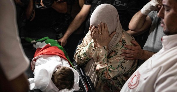 Firyal Abou Haikal, the grandmother of seven-month-old Sam Fahd Abou Haikal, weeps over his body at the Al-Ahli hospital in Hebron, West Bank, Palestine, June 6, 2026. (AFP Photo)