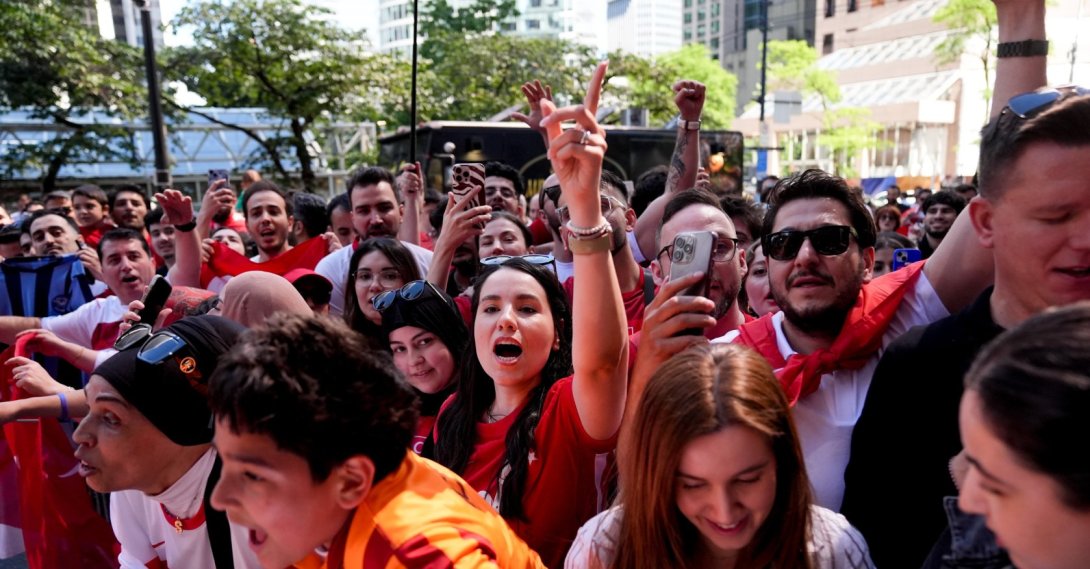 Fans gather outside the hotel as they welcome the Türkiye national football team ahead of their  2026 FIFA World Cup match against Australia, Vancouver, Canada, June 12, 2026. (AA Photo)
