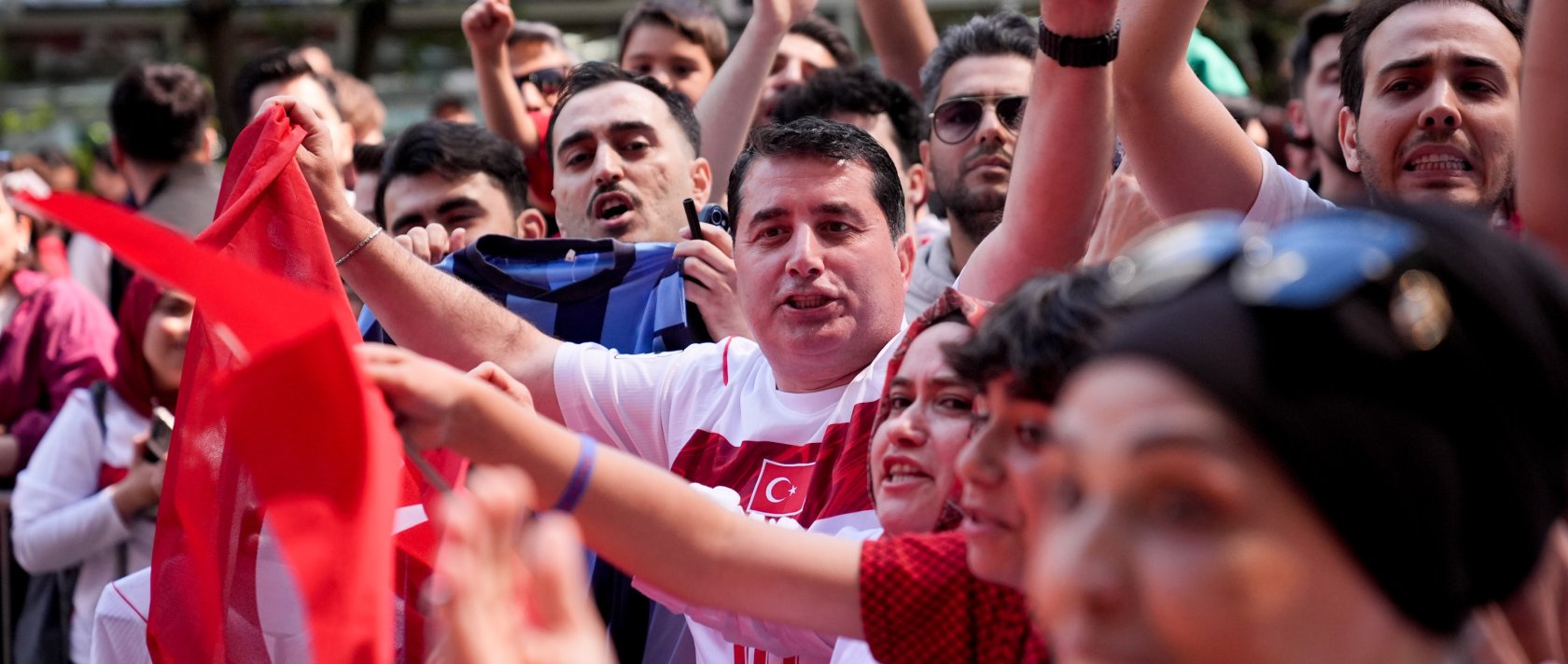 Fans welcome Türkiye's national football team outside its hotel, Vancouver, Canada, June 12, 2026. (AA Photo)