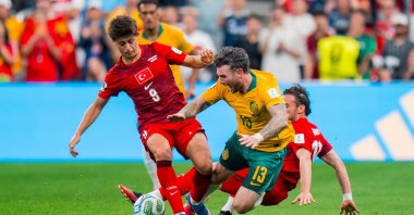 Türkiye's Arda Güler tackles Aiden Oneill of Australia during a FIFA World Cup 2026 match, in Vancouver, Canada, June 13, 2026. (EPA Photo)