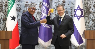 Somaliland leader Abdirahman Mohamed Abdullahi (L) and Israeli President Isaac Herzog (R) toast at the presidential residence in west Jerusalem, June 14, 2026. (EPA Photo)