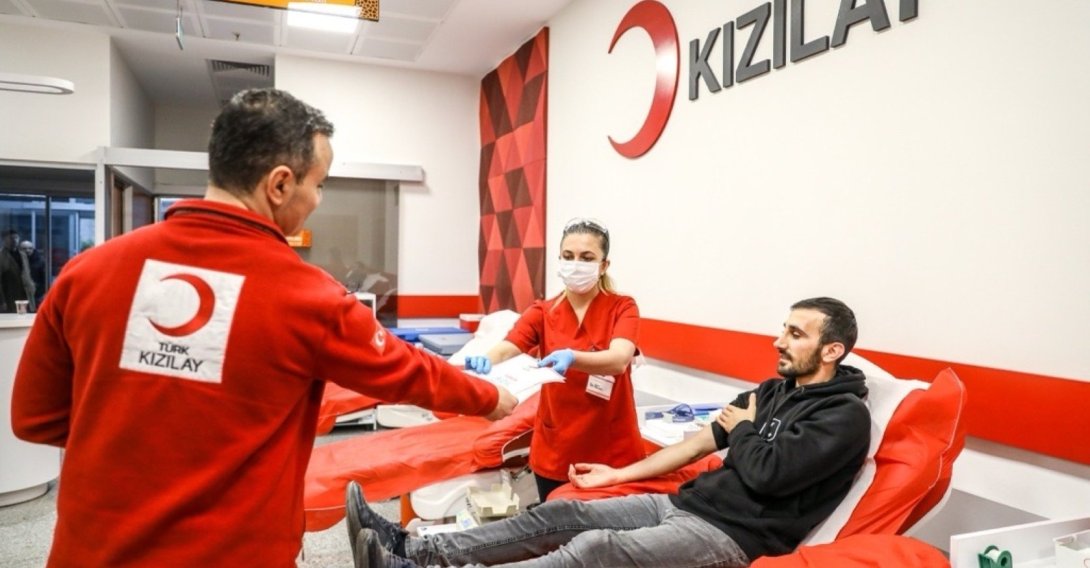 An undated photo of a volunteer donating blood at a Kızılay donation center in Türkiye. (Courtesy of Kızılay)