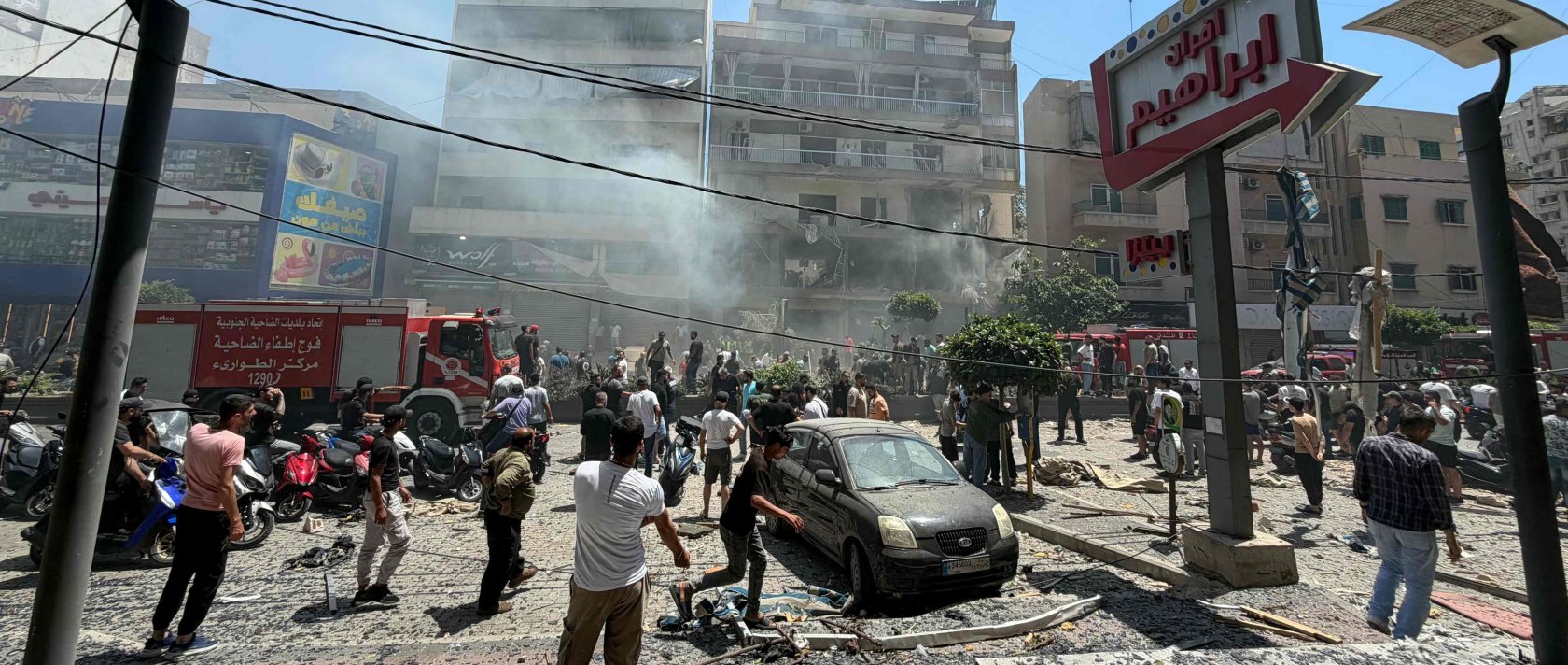 People gather at the site of an Israeli airstrike that targeted a building in the southern suburbs of Beirut, Lebanon, June 14, 2026. (AFP Photo)