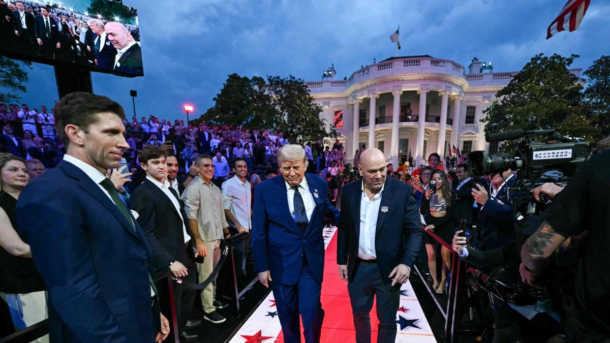 US President Donald Trump and UFC CEO Dana White arrive for the "UFC Freedom 250" mixed martial arts event on the South Lawn of the White House, Washington, U.S., June 14, 2026. (AFP Photo)