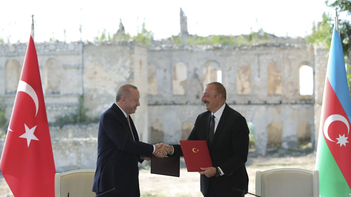 Azerbaijan's President Ilham Aliyev (R) and President Recep Tayyip Erdoğan shake hands after signing the Shusha Declaration, Shusha, Azerbaijan, June 15, 2021. (AP Photo)